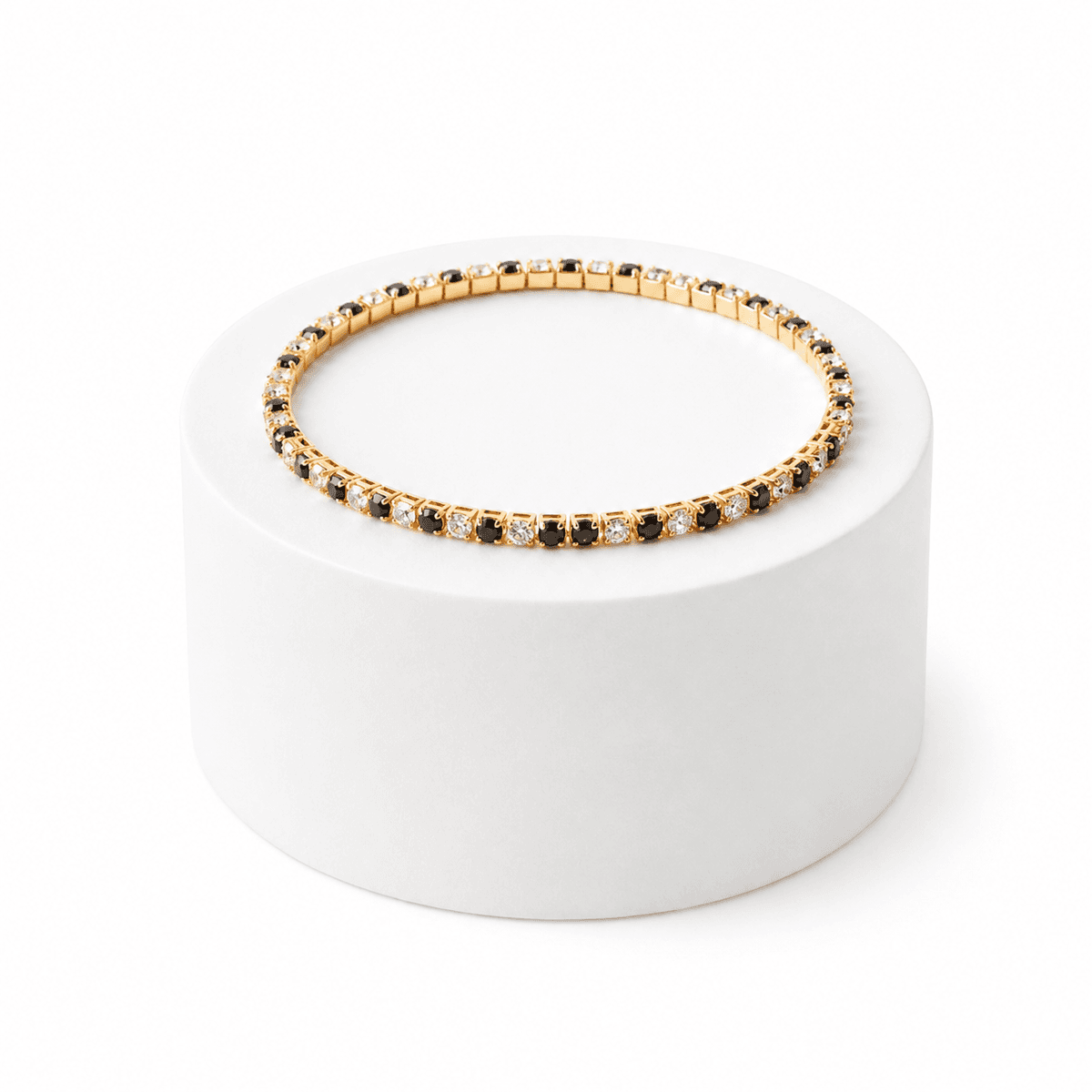 Bracelet Tennis Doré à Cristaux Noirs et Blancs – Élégance Intemporelle