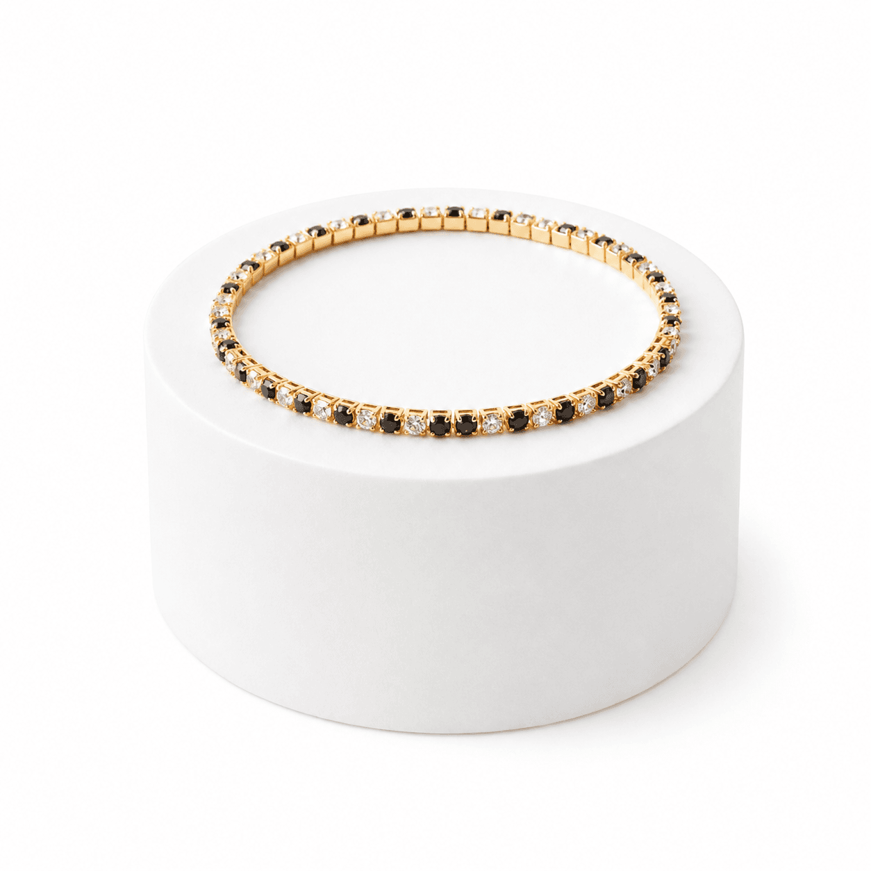 Bracelet Tennis Doré à Cristaux Noirs et Blancs – Élégance Intemporelle