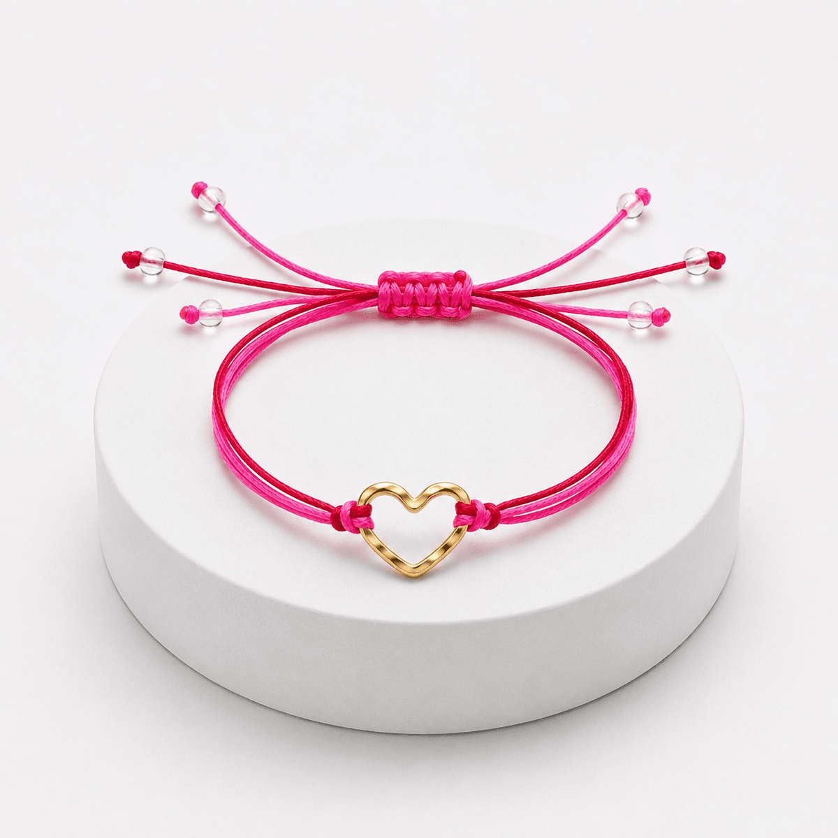 Bracelet Cœur en Acier Inoxydable Doré sur Fil Rouge et Rose Ajustable