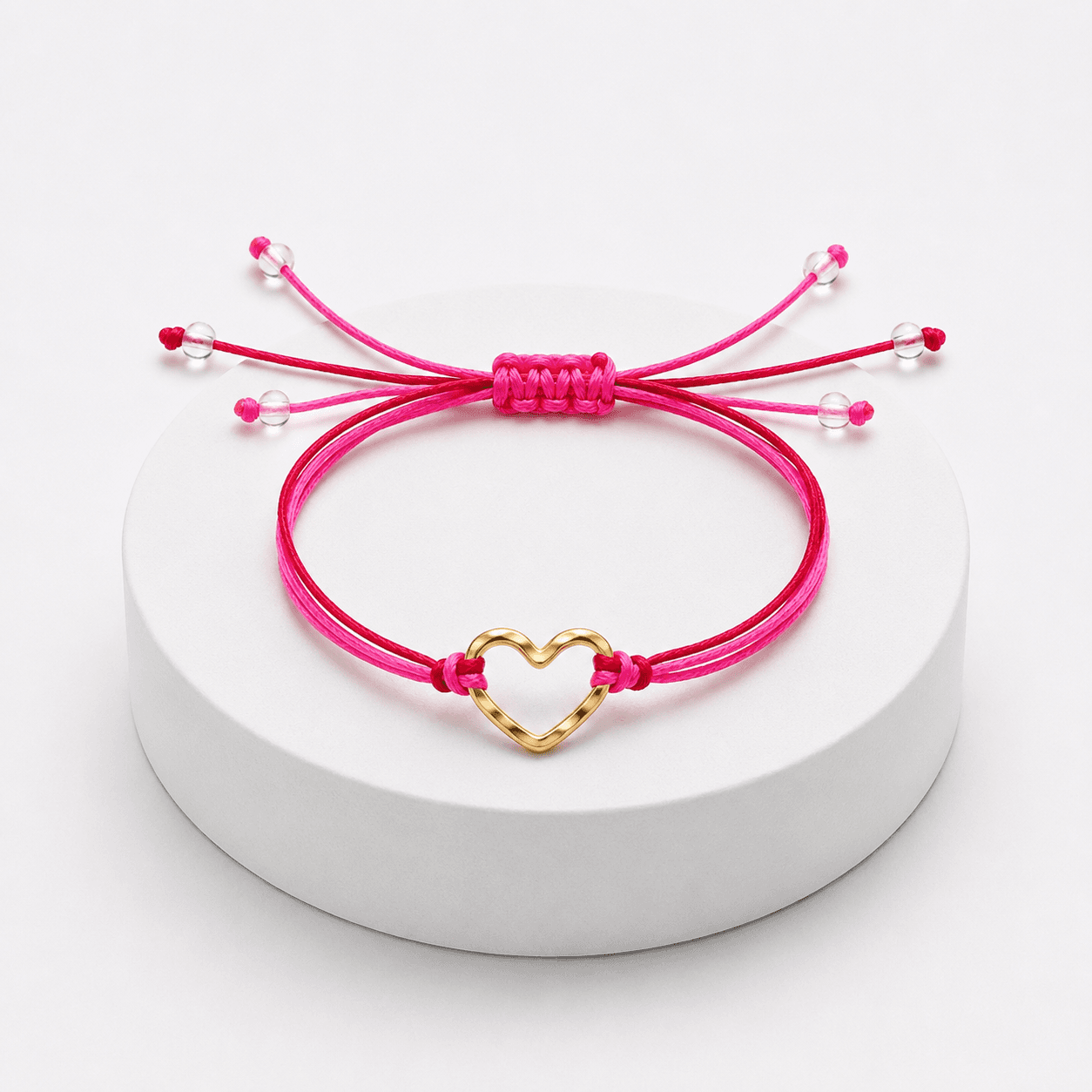 Bracelet Cœur en Acier Inoxydable Doré sur Fil Rouge et Rose Ajustable