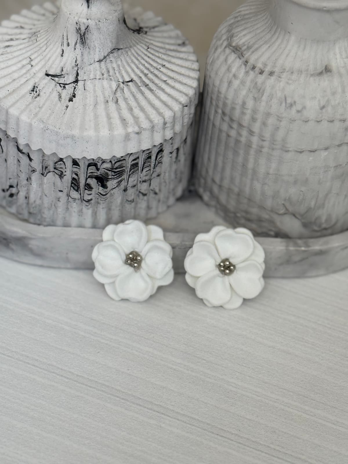white earrings