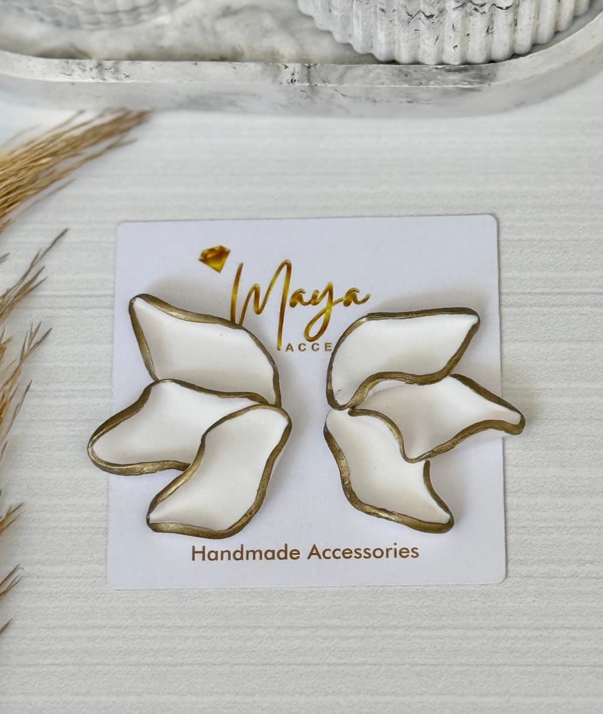 classy white and gold earrings