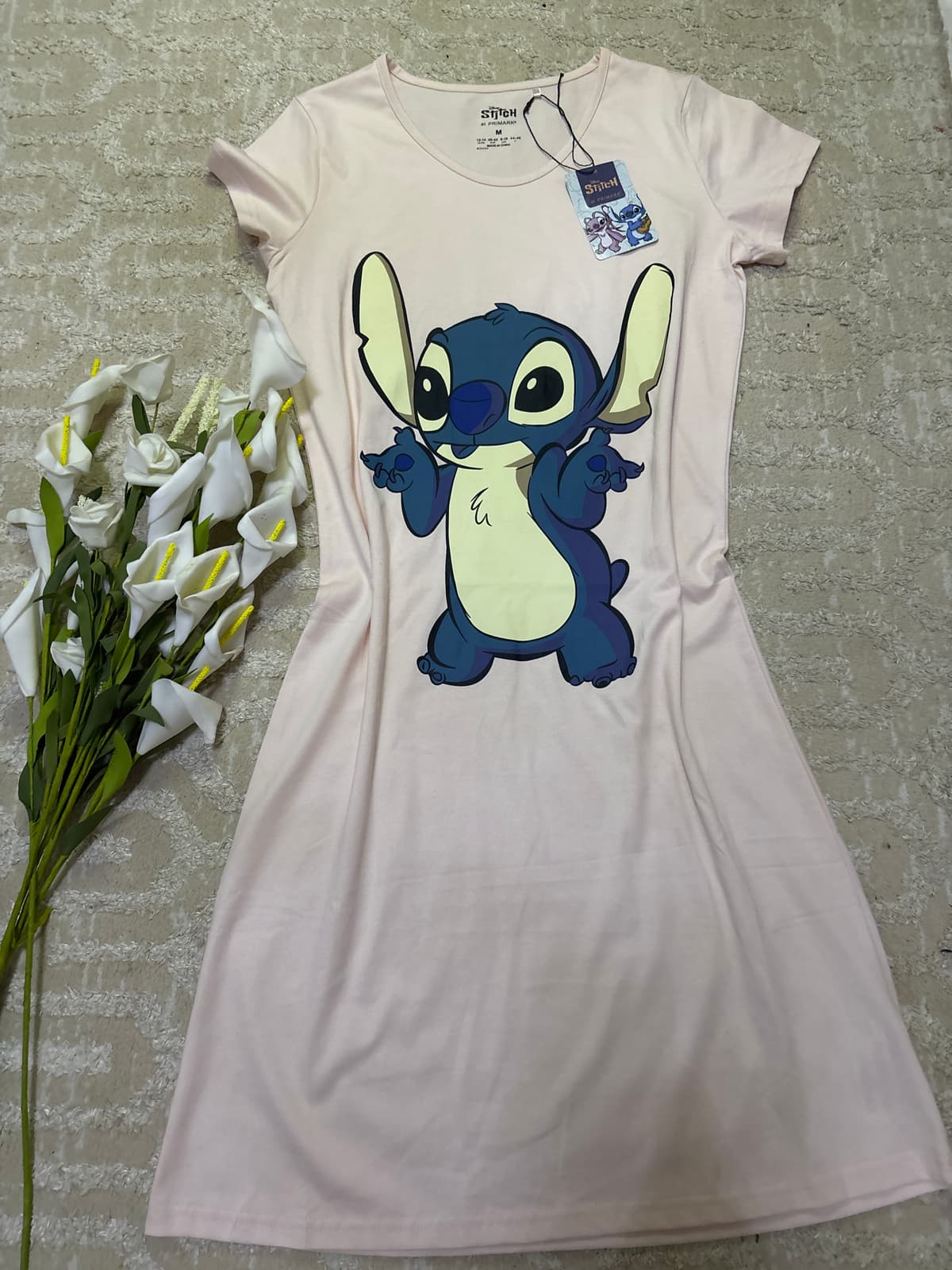 Robe pyjama motif stitch rose pâle