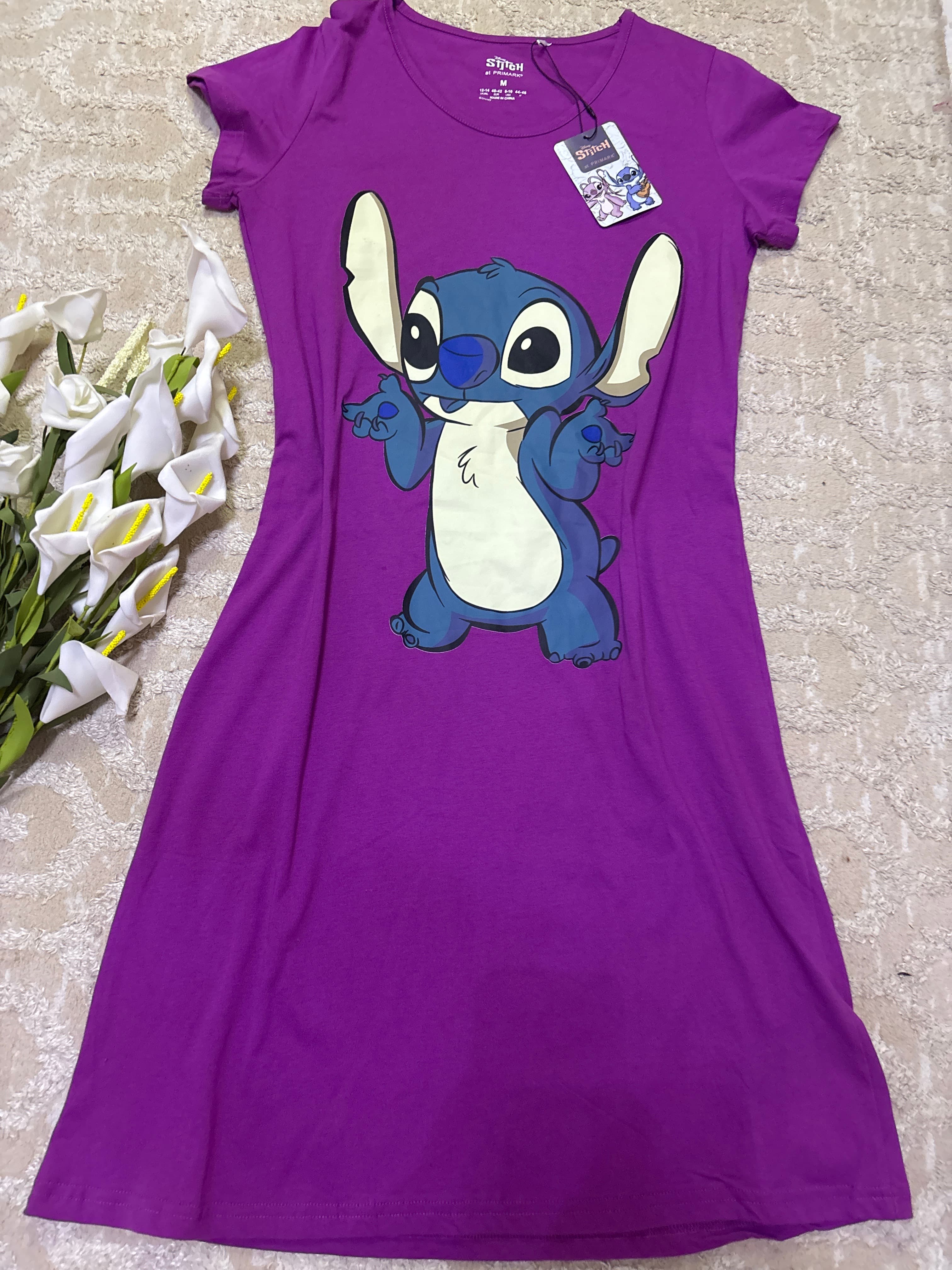 Robe pyjama motif stitch move